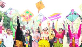 Students of KMV College fly kites on the college campus on the occasion of Basant Panchmi in Jalandhar Saturday
