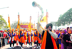 Devotees take part in a nagar kirtan procession in Mohali on Sunday