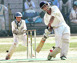 A batsman plays a shot during the Sardar Bhagwant Singh Memorial Cricket Tournament at Vivek High School, Sector 38, Chandigarh, on Sunday