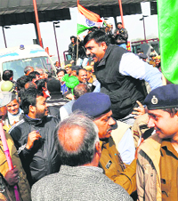 Members of the Toll Hatao Sangharsh Samiti hold a protest in Gurgaon on Sunday.