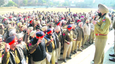 Khanna SSP briefs police personnel on election duty at Khanna on Sunday. 