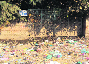 Heaps of garbage lying in front of a night shelter for the homeless at Jagraon. 