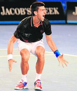 Novak Djokovic reacts after beating Rafael Nadal in Melbourne on Sunday. Djokovic won 5-7. 6-4. 6-2. 6-7. 7-5.