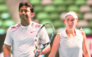 Leander Paes (L) and Elena Vesnina during their mixed doubles final against Bethanie Matteck-Sands and Horia Tecau in Melbourne on Sunday. 