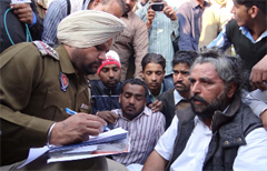 A SAD (B) worker lodges a police complaint against Congress men after supporters of the two parties clashed near the DAV College in Bathinda on Monday evening.