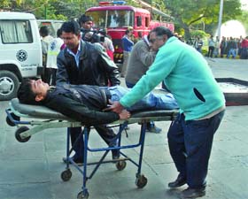 Security personnel perform a mock drill at the NDMC building near Jantar Mantar in New Delhi on Monday