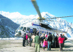 A helicopter at the Killar heliport that was used to carry patients, officials and people to snow-bound areas of Chamba.
