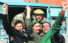 Members of the Urban Local Bodies Employees United Forum being taken into preventive custody after a protest in Srinagar on Monday. 