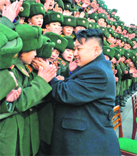 North Koreas new leader Kim Jong-un greets students on the occasion of Chinese New Year in Pyongyang. Young Kim gets rock-star treatment when he visits troops, just as his father. While the late Kim Jong-il mostly stayed aloof, his son holds hands and gives out hugs
