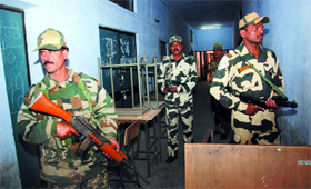 Paramilitary forces guard the electronic voting machines kept at Government Polytechnic College in Bathinda on Tuesday.
