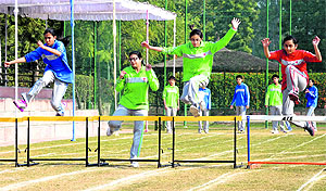 Students take part in an athletics meet at Strawberry Fields School in Sector 26 of Chandigarh on Tuesday.