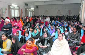 Students of MKP Girls College listen to the sangeet