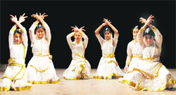Girls perform a dance at the Gaiety Theatre in Shimla.