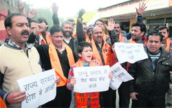 Members of the Shiv Sena Hindustan protest against the state government over discrimination with the Jammu region during the Republic Day parade, in Jammu