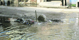 A view of a street flooded with sewage in the Fily Gate area of Jagraon.