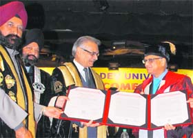 Punjab Governor Shivraj Patil presents the Doctor of Science (Honoris Causa) degree to NR Narayana Murthy during the 38th annual convocation of GND University in Amritsar on Wednesday