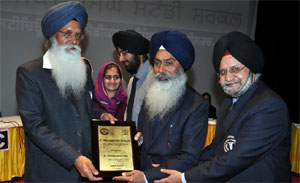 Memento being presented by the dignitaries on the occasion.