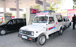 A police Gypsy being refuelled at the Sector 33 petrol station after the MT Section in the Police Lines, Chandigarh, ran out of fuel