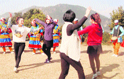 Traditional choliya dancers of Kumaon with Korean students who are learning this dance form in Pithoragarh.