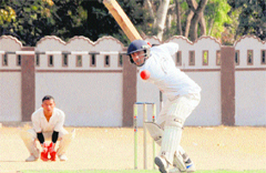 A batsman in action in a match in the 60th Dehradun District Cricket League in Dehradun