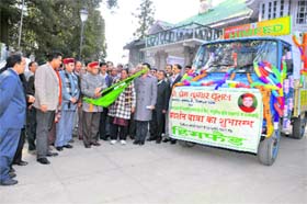 Chief Minister PK Dhumal flags off an exhibition van demonstrating modern farm machinery in Shimla on Wednesday