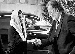 Afghan Foreign Minister Zalmai Rasool (R) greets his Pakistani counterpart Hina Rabbani Khar in Kabul on Wednesday