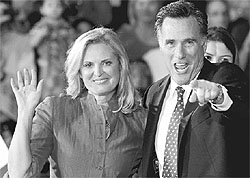 Republican presidential hopeful Mitt Romney with his wife Ann in Florida on Tuesday