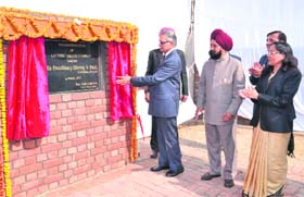 Punjab Governor Shivraj Patil lays the foundation stone of a lecture theatre complex at Guru Nanak Dev University in Amritsar. Also in the picture is Vice-Chancellor AS Brar