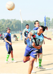 Players of Manipur and Rohtak universities in action during inter-university handball tournament at Panjab University in Chandigarh on Thursday. 