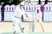 A batsman in action in a match in the 60th Dehradun District Cricket League Tournament in Dehradun on Thursday. 