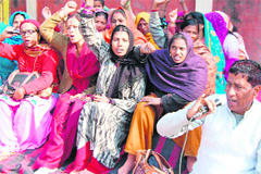 Hema Rawat and other women activists at Roorkee in Haridwar on Thursday. 