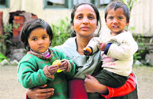 Himanchali Yadav with her children at the Sanjeevni home in Jalandhar on Thursday.