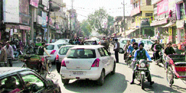 Traffic congestion is one of the major problems faced by shoppers in Ghumar Mandi.