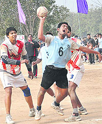 Players of PU and Kurukshetra University in action during the final match of the Inter-University Handball Tournament at Panjab University, Chandigarh, on Friday