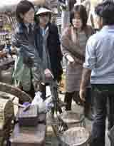 Women at a stall in the Surajkund Crafts Mela.