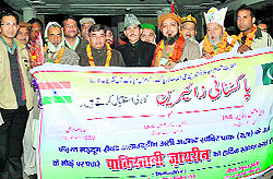 Pakistani pilgrims being welcomed at Roorkee on Friday