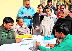 Army personnel of the Garhwal Rifles, Lansdowne Regiment, Pauri Garhwal, listen to the woes of war widows at the Army Welfare Office in Haridwar on Friday