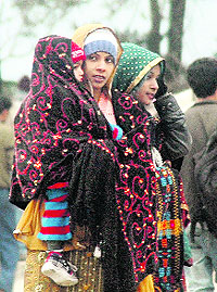 They are all wrapped up in woollens to beat the chill in Shimla