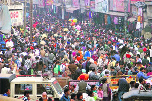 A view of the densely populated Chaura Bazar, where people from all sections of society come for shopping during the Sunday market, in Ludhiana.