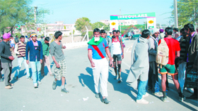 Candidates leave the Cantonment area after appearing for the physical test for the recruitment drive.