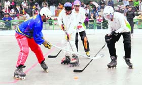 A roller-hockey match in progress during the 49th National Artistic and Inline Roller-Hockey Skating Championship at KBDAV School, Sector 7, Chandigarh, on Saturday