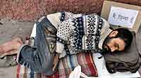 Santosh Singh, actor Nana Patekars cook, has been sitting at Jantar Mantar with a playcard that reads, Main zinda hoon, in New Delhi on Saturday. Singh says he was declared dead by his kin in UP and his property usurped after he married a Dalit girl from Mumbai
