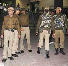 Delhi police personnel keep vigil outside the Mayur Vihar Phase 1 Metro station in east Delhi on Saturday