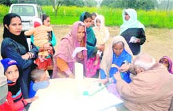 Women get their check-up done in Dhanpura village in Haridwar 
