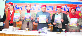 Chief Minister PK Dhumal (centre) presides over a state-level meeting of the Diploma Engineers Association in Una on Saturday.