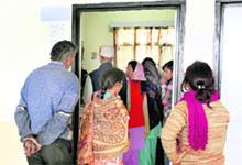 Applicants and beneficiaries of the Shagun Scheme at the Social Welfare Department in the District Administrative Complex in Jalandhar; 