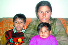 Manjinder Kaur with her children in Jalandhar.