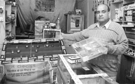 The owner shows his ransacked shop at Sohana village in Mohali on Sunday.