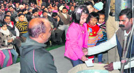 Children at a draw of nursery admissions at a school in Chandigarh. 