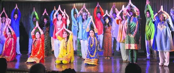 Artistes of Natrang perform a dance show at Shri Mata Vaishno Devi University in Katra on Sunday.